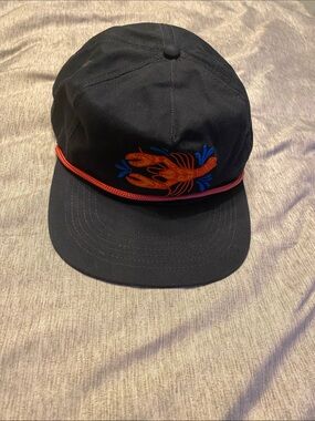 Raised by Coyotes Snap Back Hat w/ Embroidered Lobster